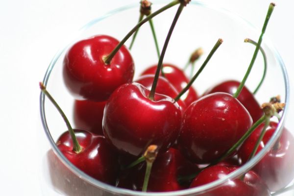 Cherries in a wine glass