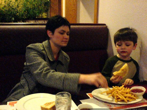 nick sharing his french fries in a chinese restaurant - DSC00400