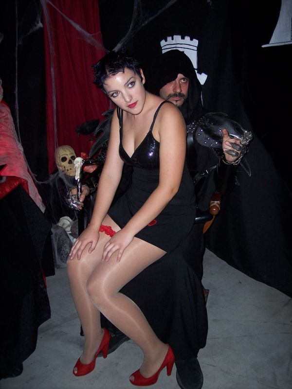Betty Boop on Black Knight knees.