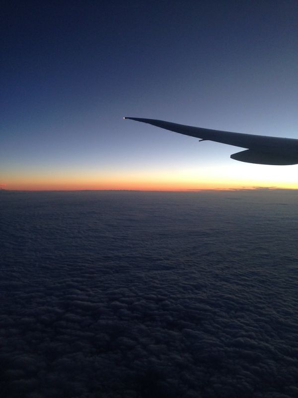 Sunset over the clouds en route to Hamburg from Dubai with Emirates in a Boeing 777-300ER
