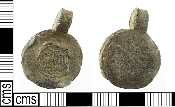 <div class='fn'> A complete Post Medieval - Modern lead alloy cloth seal dating to late 16th - 19th century.</div>