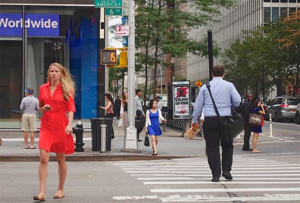 This woman is probably a tourist: New Yorkers hardly ever wear red ...