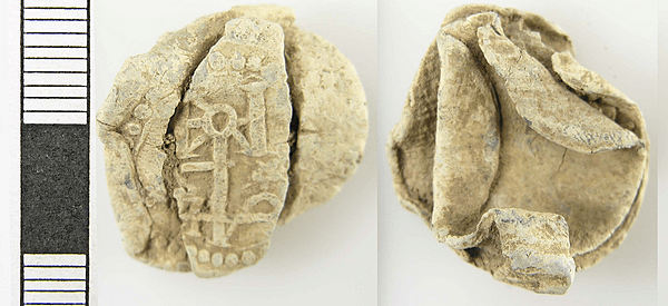 <div class='fn'> A Post Medieval lead alloy cloth seal (16th – early 17th century).</div>