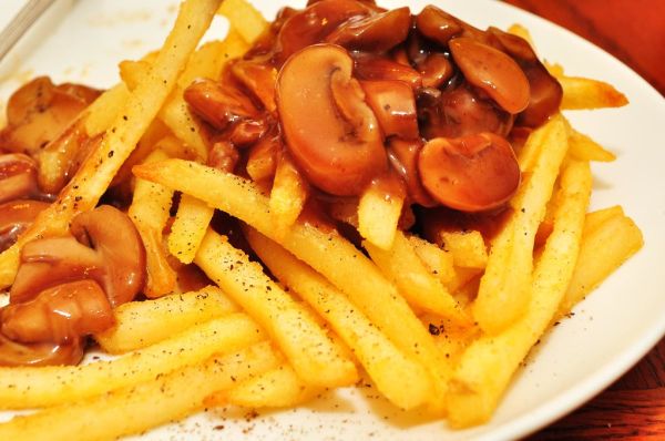 Mmm... french fries with mushroom sauce